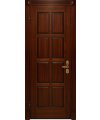Дверь входная в квартиру Cerber 15 - Наборная МДФ панель с покрытием натуральным шпоном. Цвет: Орех классический. Резные наличники дополнены декоративными элементами.