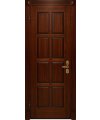 Дверь входная в квартиру Cerber 24 - Наборная МДФ панель с покрытием натуральным шпоном. Цвет: Орех классический. Резные наличники дополнены декоративными элементами.