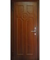 Дверь входная в квартиру Cerber 24 - МДФ панель с покрытием натуральным шпоном декорирована фрезеровкой. Наличники гладкие с зарезкой под петли.