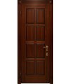 Дверь входная в квартиру Cerber 25 - Наборная МДФ панель с покрытием натуральным шпоном. Цвет: Орех классический. Резные наличники дополнены декоративными элементами.