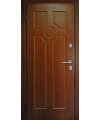 Дверь входная в квартиру Cerber 28 - МДФ панель с покрытием натуральным шпоном декорирована фрезеровкой. Наличники гладкие с зарезкой под петли.